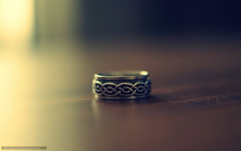 Celtic ring on wooden surface