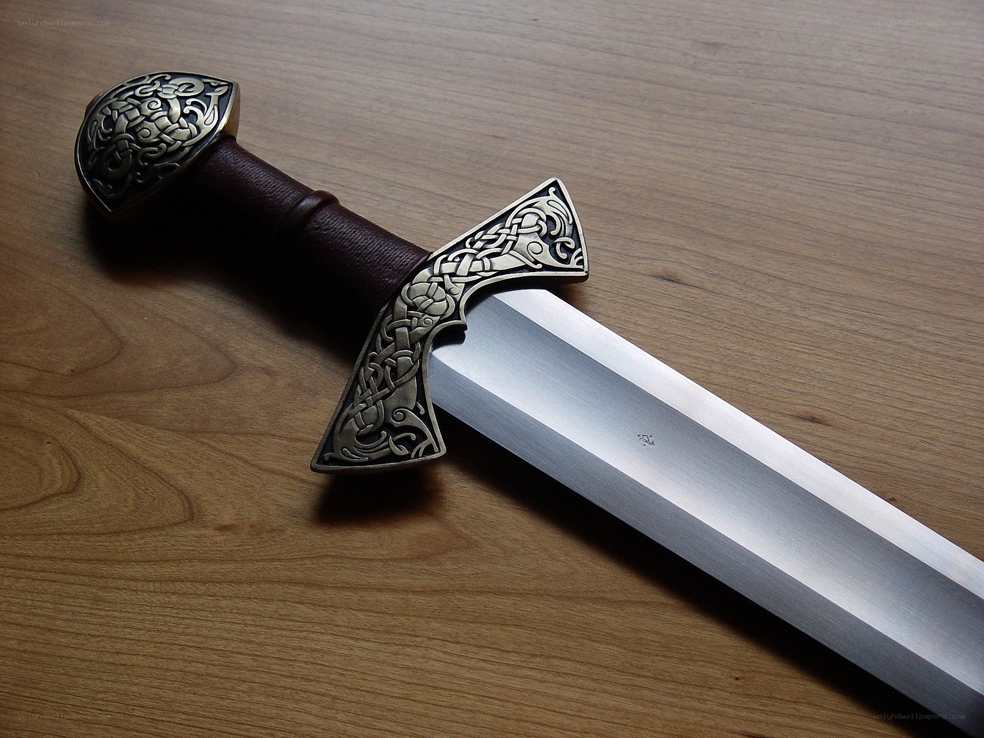 Celtic sword on wood