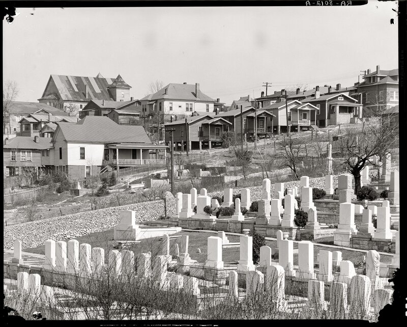 Cemetery and houses on a hillside