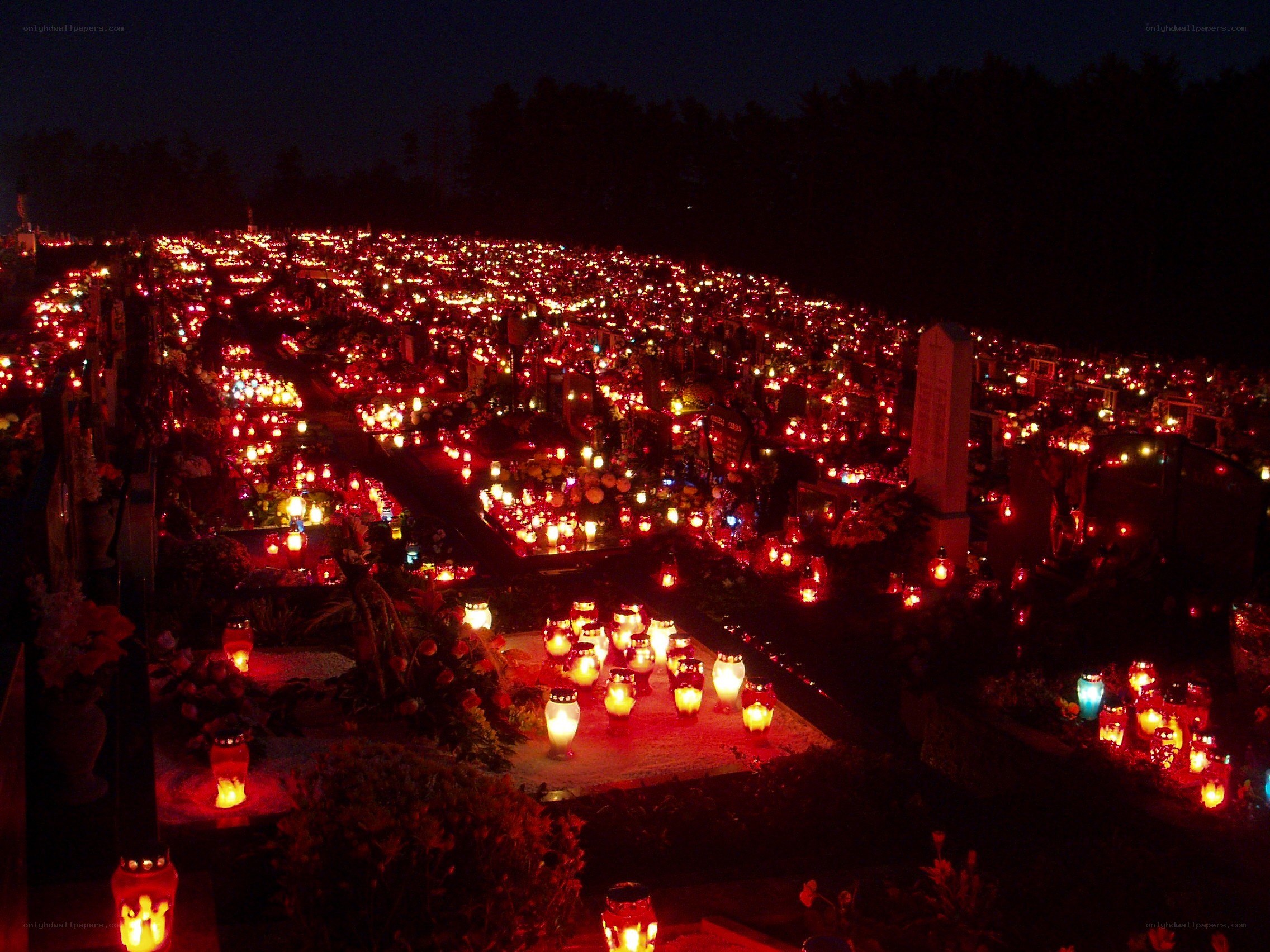 Cemetery at night with candles