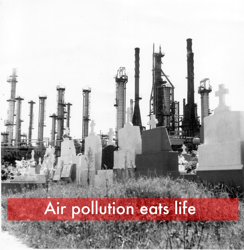 Cemetery near industrial plant