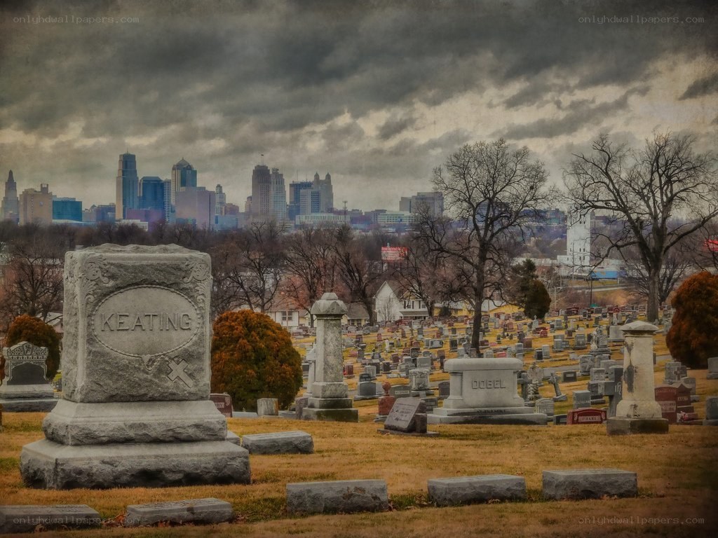 Cemetery with city skyline