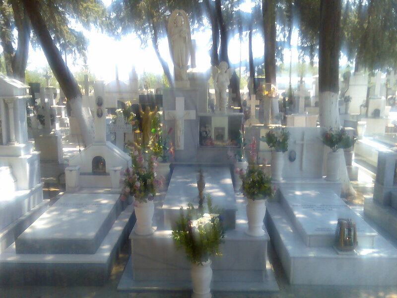 Cemetery with graves and statues