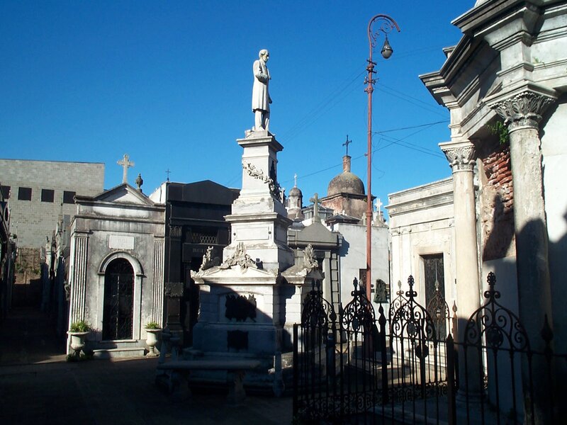 Cemetery with statue and mausoleums