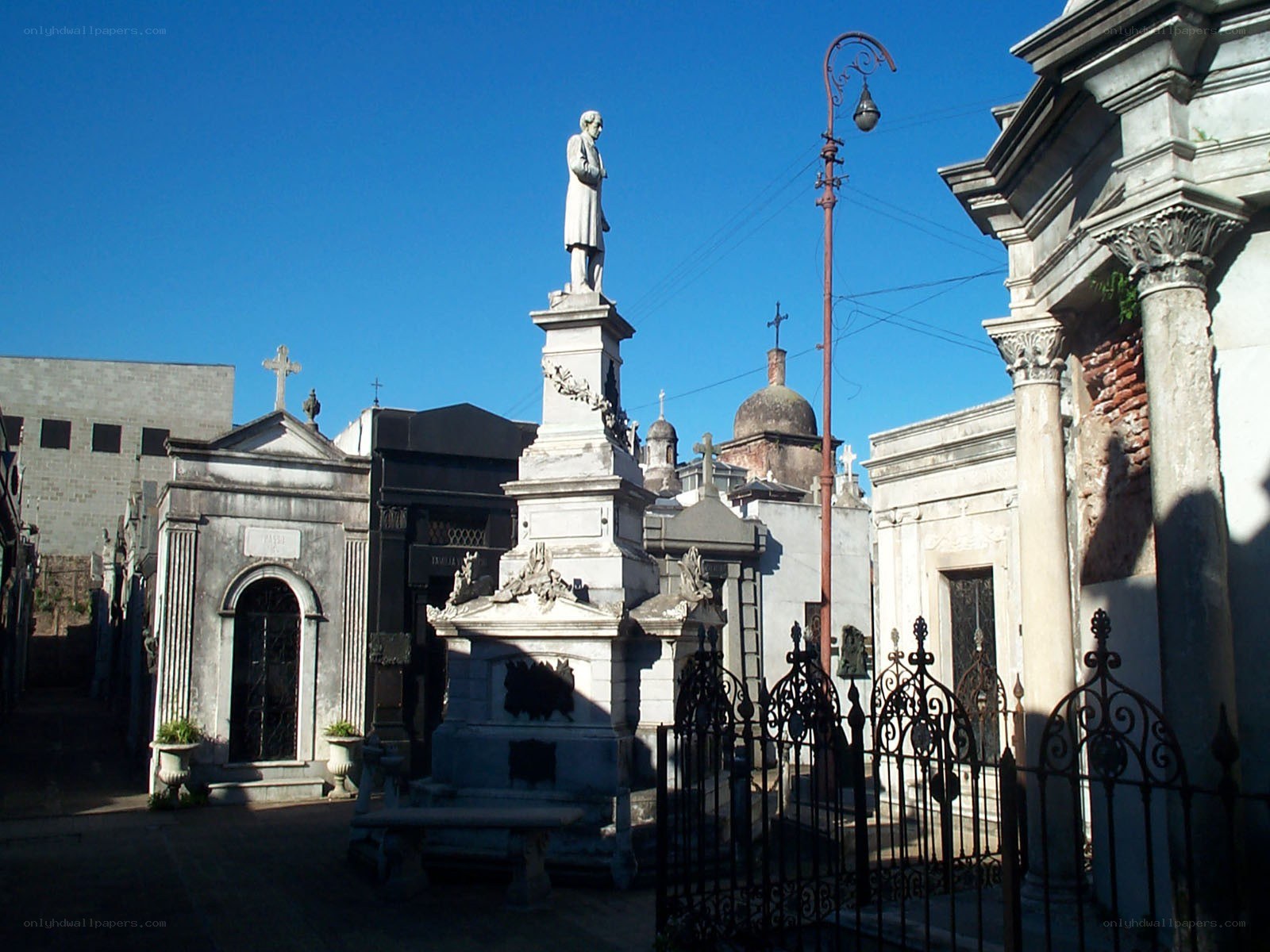 Cemetery with statue and mausoleums