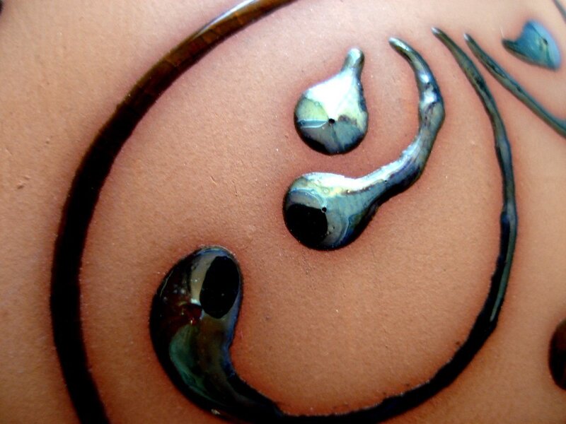 ceramic artwork with metallic glaze