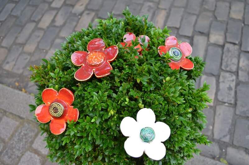Ceramic Flowers in Bush