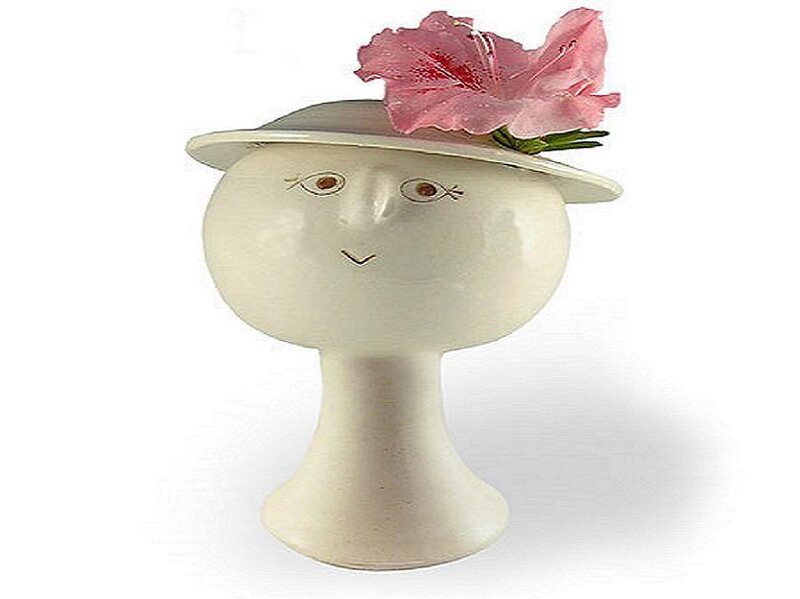ceramic head with flower hat