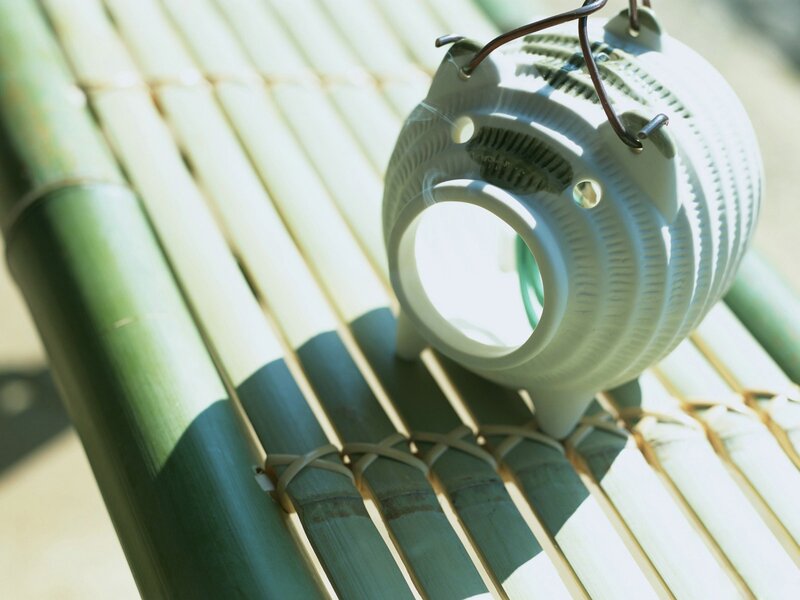 ceramic lantern on bamboo