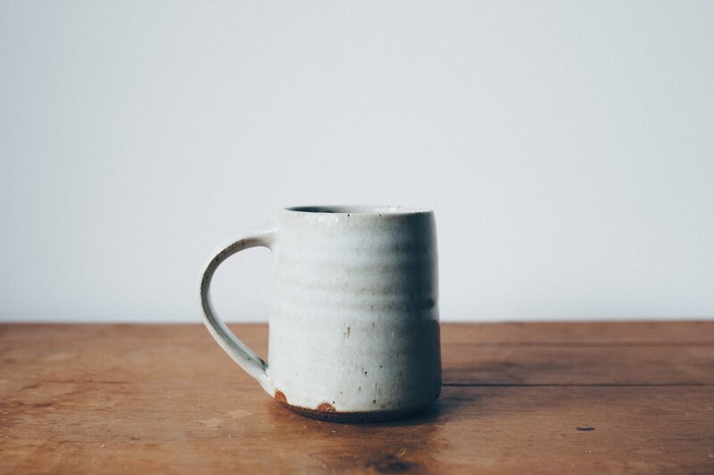 ceramic mug on wooden table