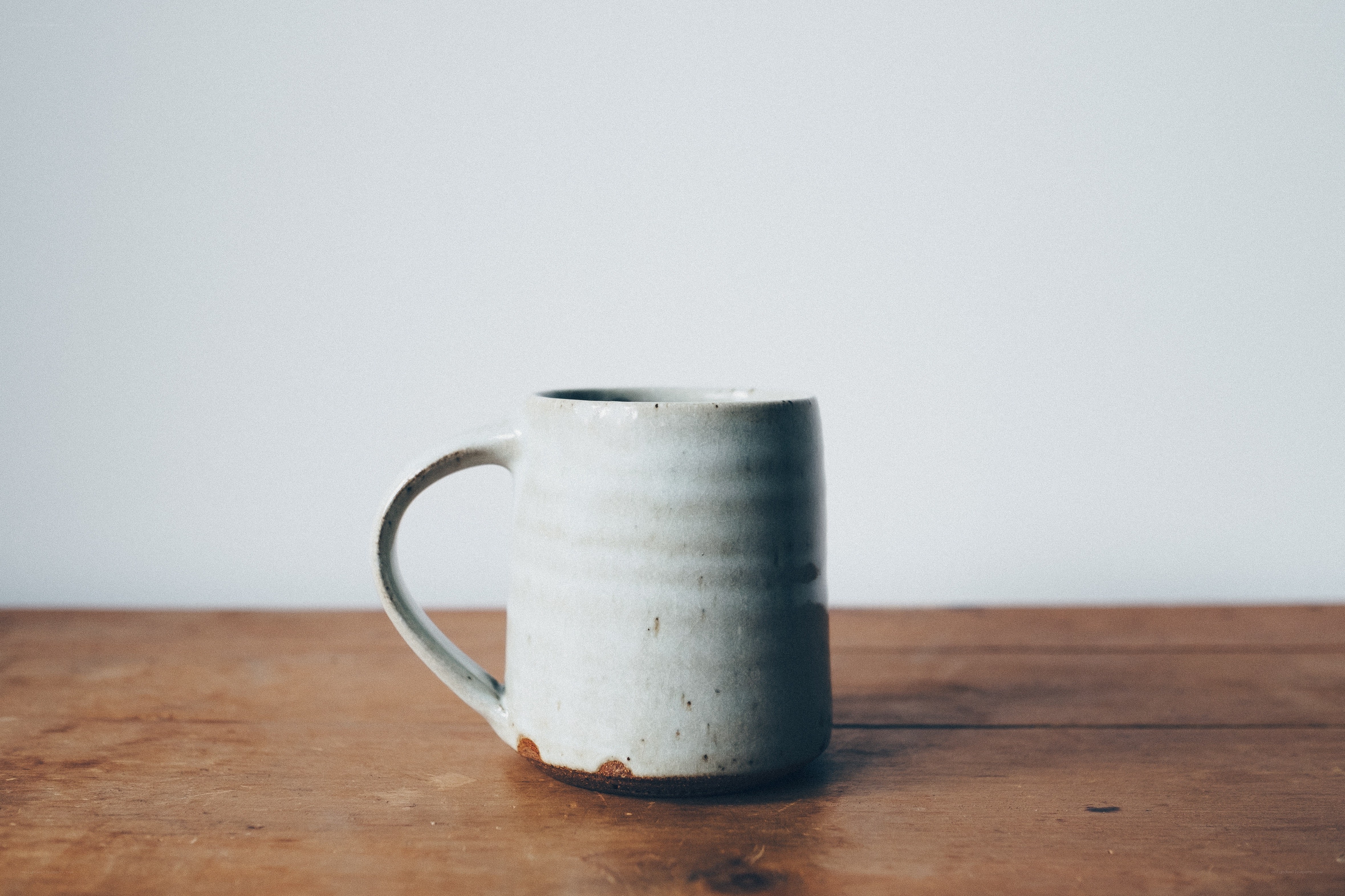 ceramic mug on wooden table