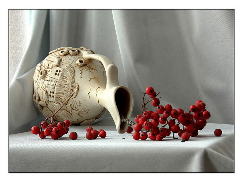 ceramic pitcher with berries