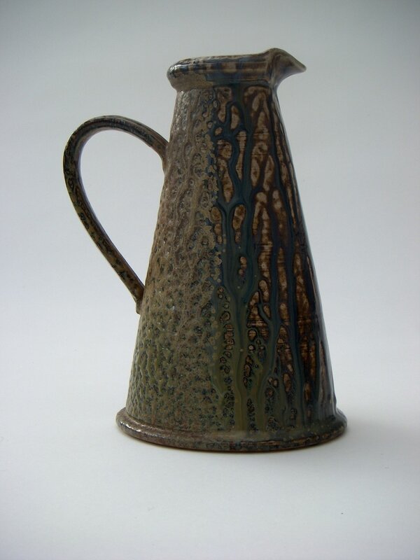 ceramic pitcher with glazed pattern