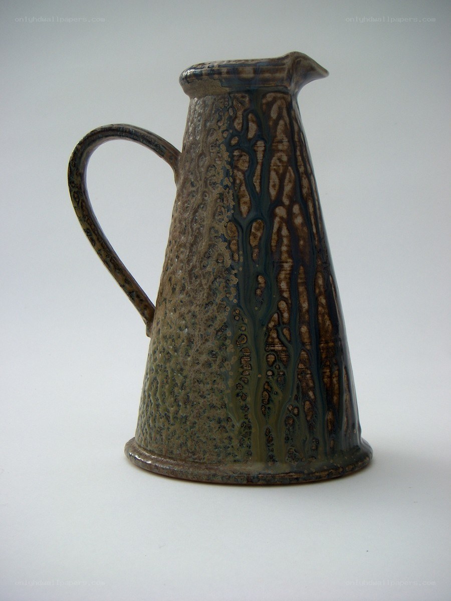 ceramic pitcher with glazed pattern