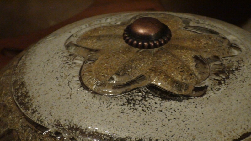 ceramic pot lid with flower design
