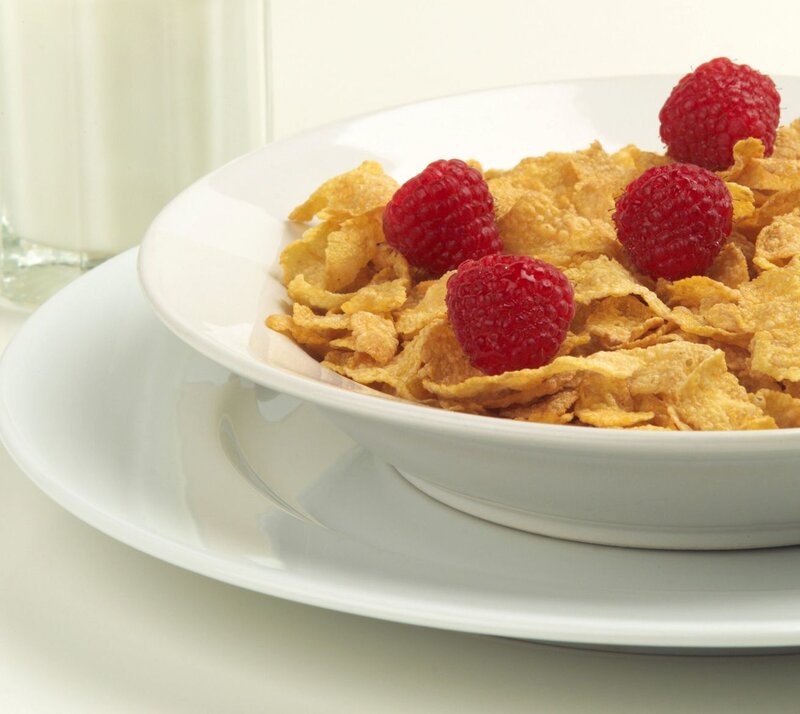 cereal with raspberries and milk