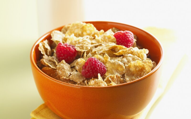 cereal with raspberries in bowl