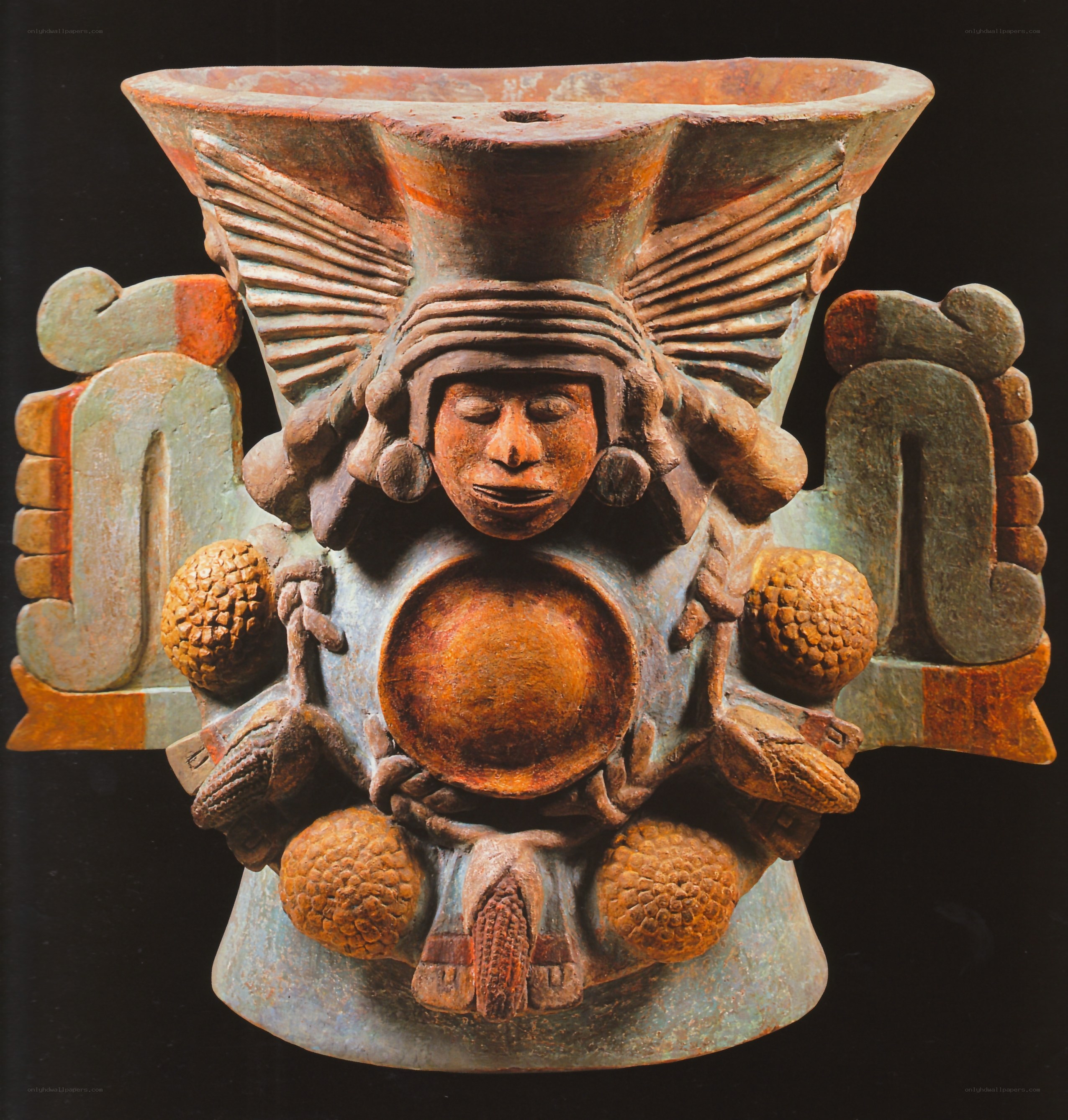 ceremonial vessel with deity figure