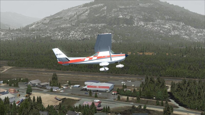 Cessna aircraft flying over forest