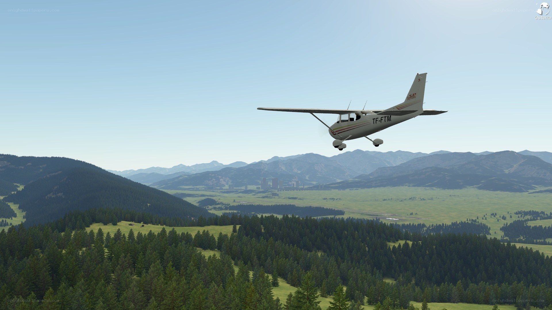 Cessna flying over mountains