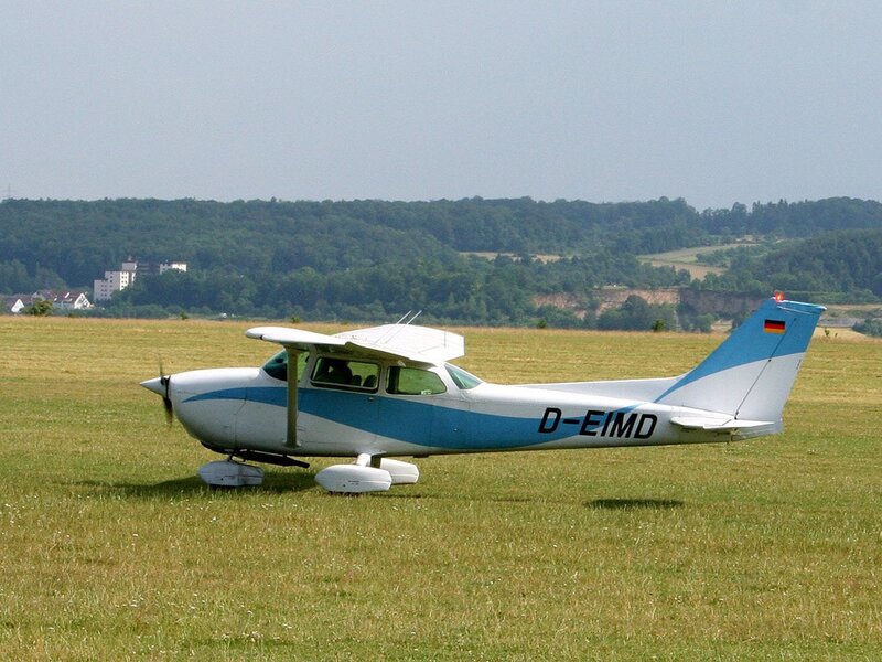 Cessna on a grass airfield