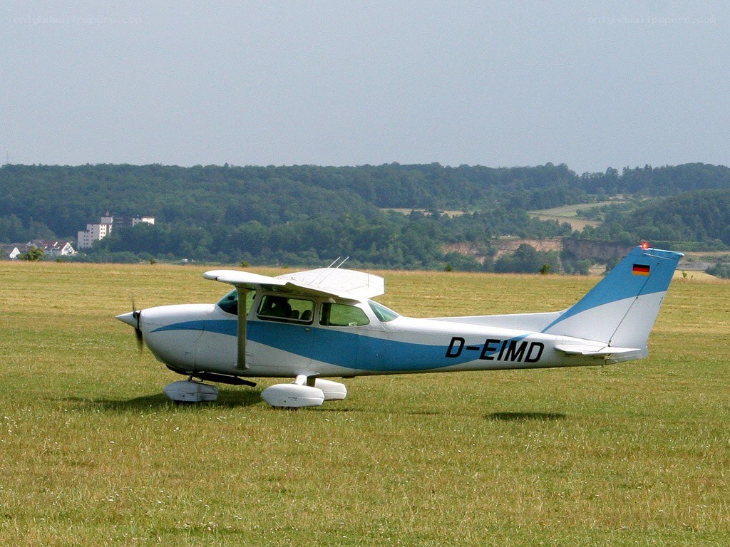 Cessna on a grass airfield