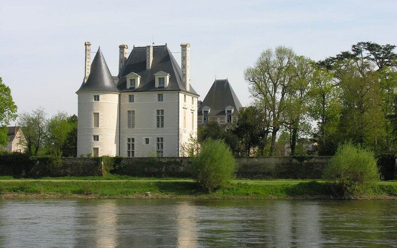 Château de Montpoupon by the river