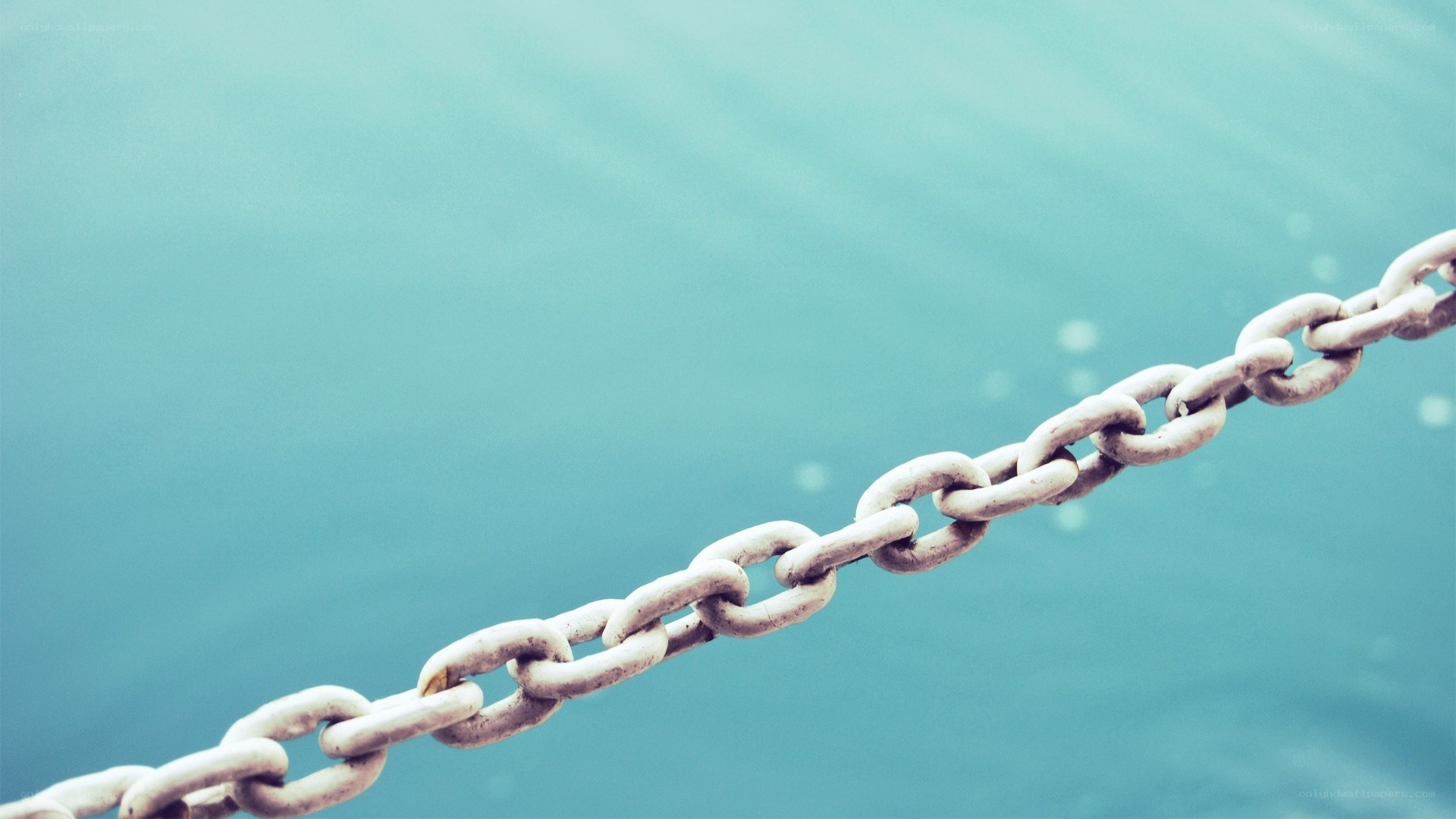 chain against blue water