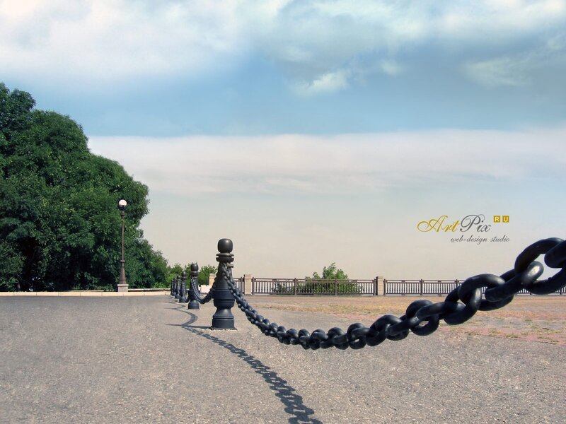 Chain barrier on a paved path