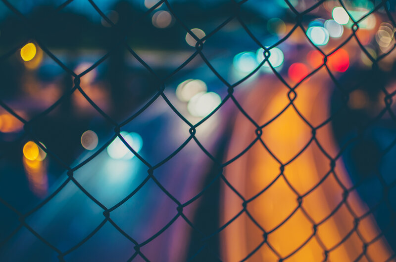 Chain-link Fence at Night — Blue