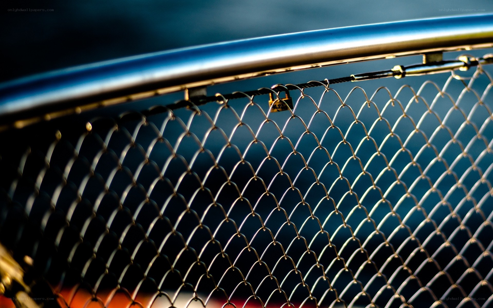 Chain-link fence with padlock