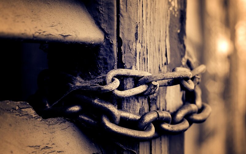 chain on old wooden door