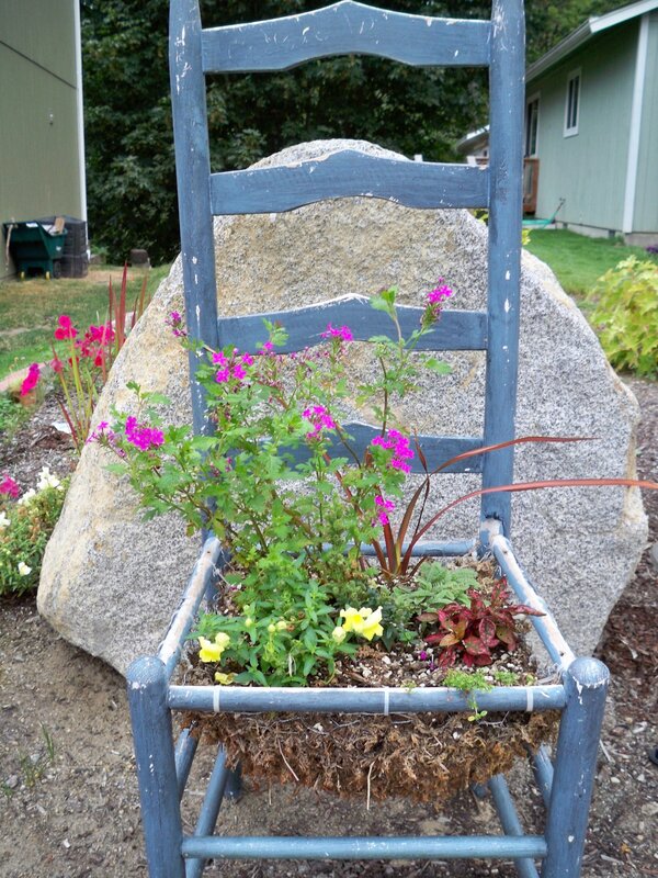 chair planter with flowers