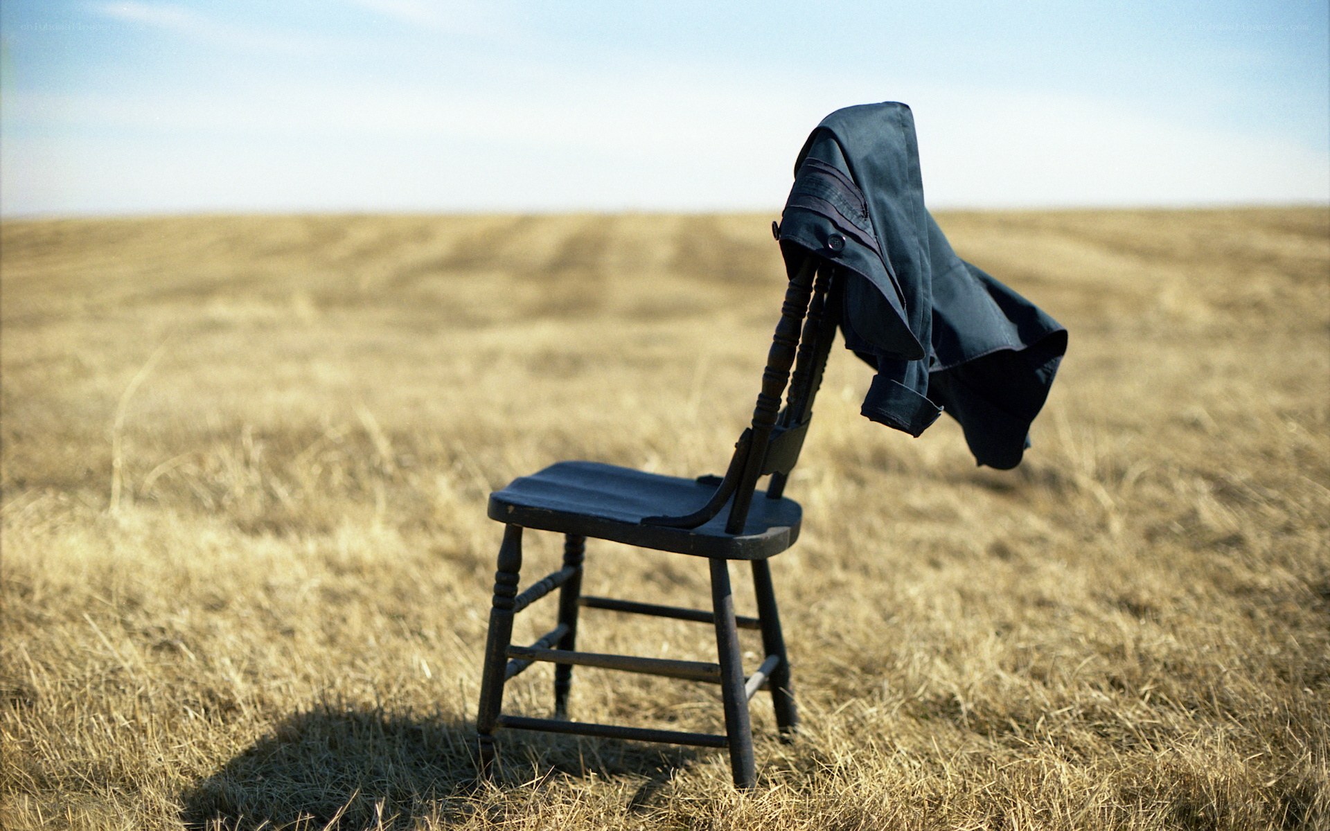 Chair with jacket in field