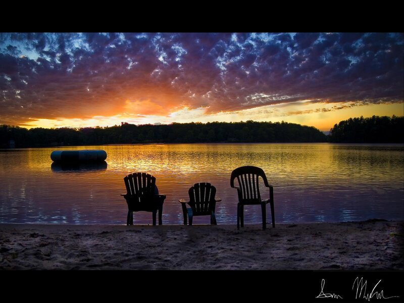 Chairs at sunset by the lake
