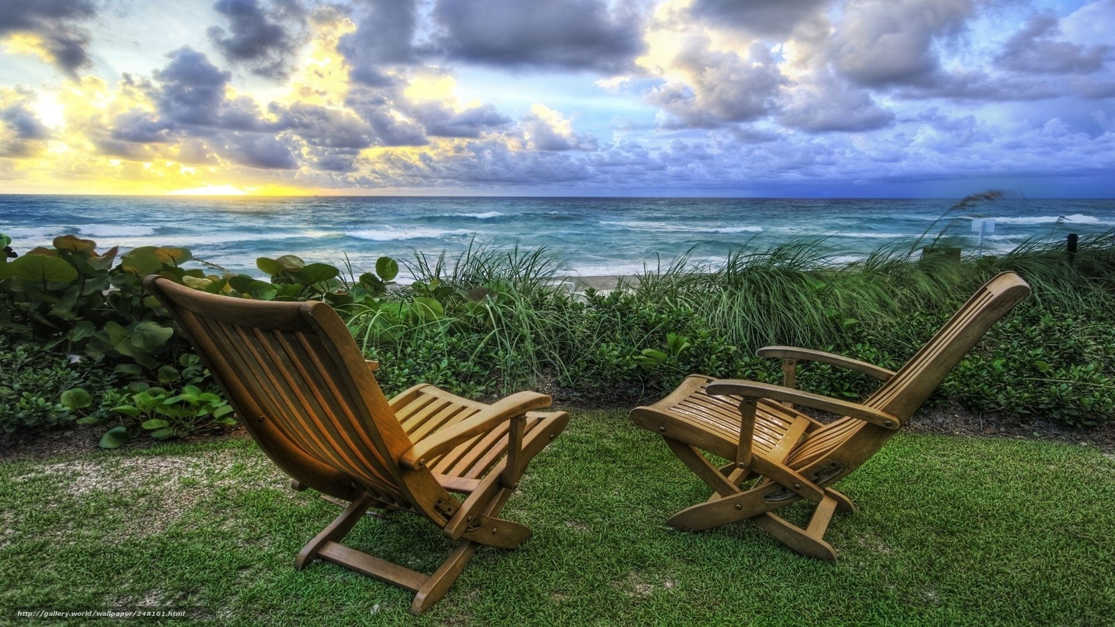 Chairs at the beach at sunset