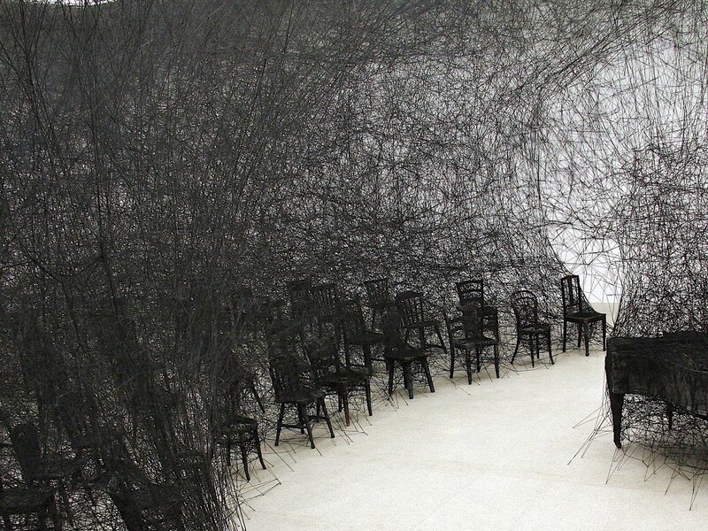 Chairs in a wire mesh installation