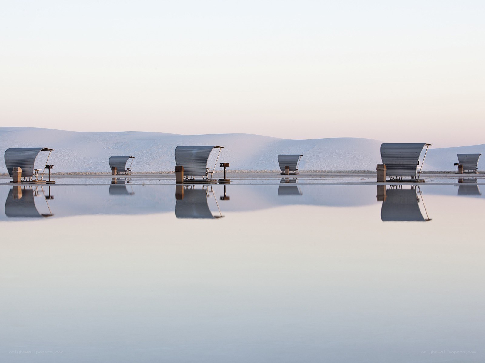 Chairs on a reflective surface