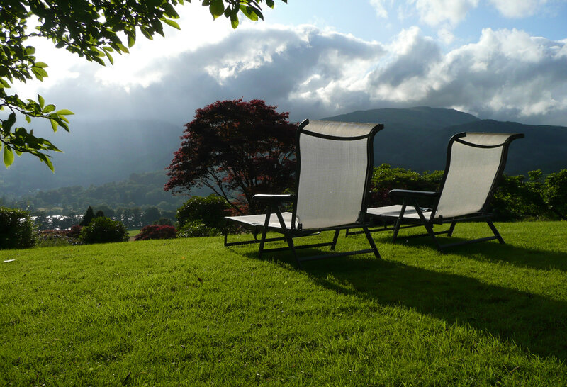 Chairs overlooking a mountain valley
