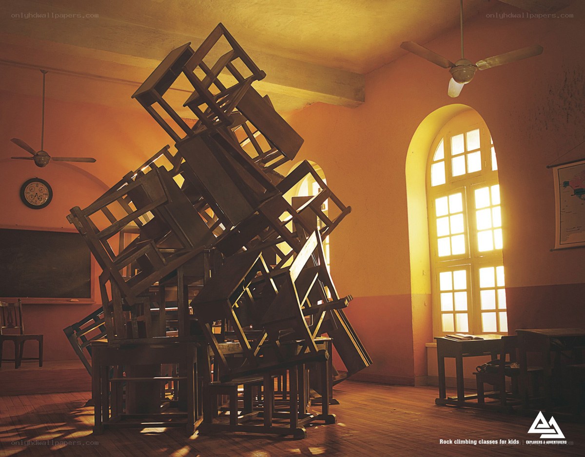 Chairs stacked in classroom