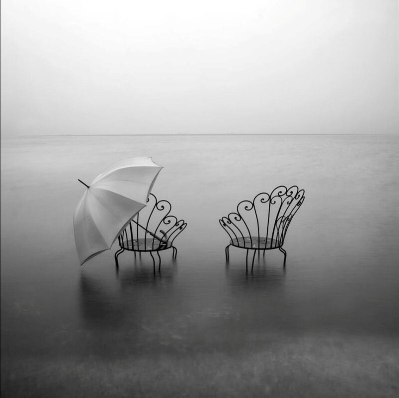 Chairs with Umbrella in Water