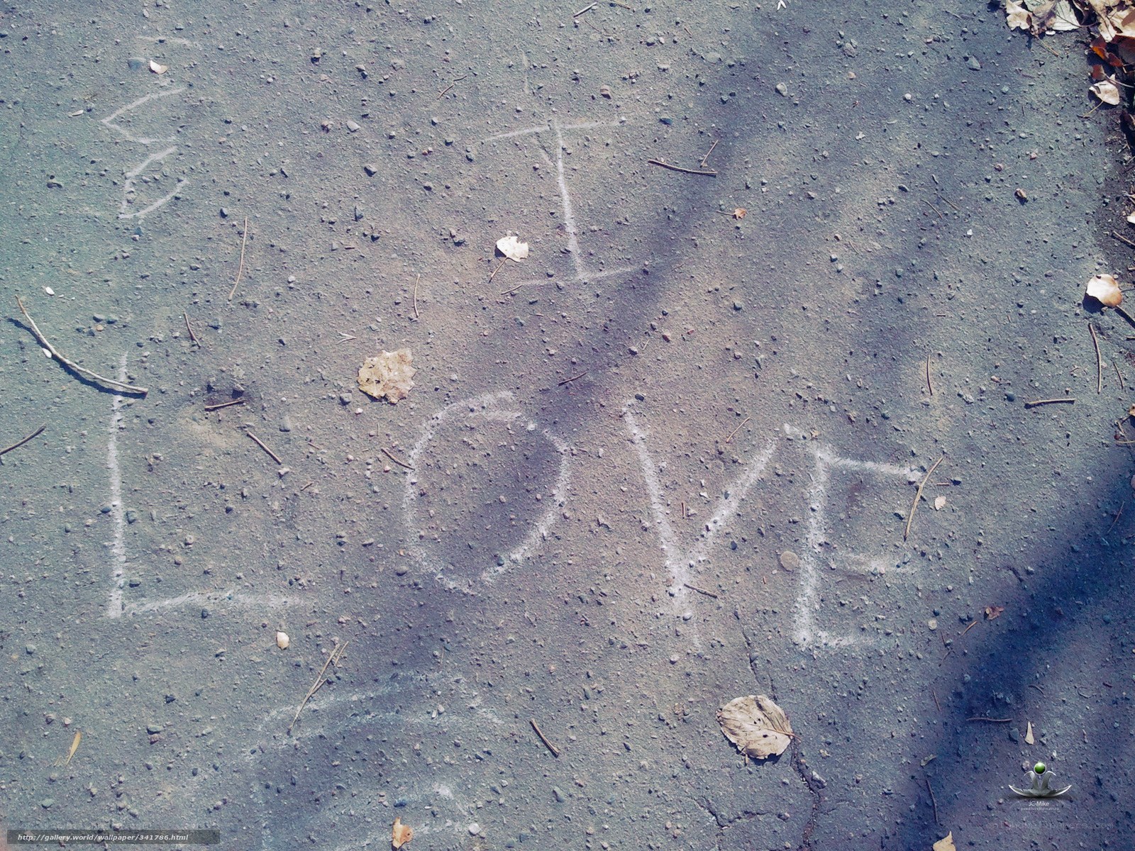 Chalk drawing of 'I love' on pavement
