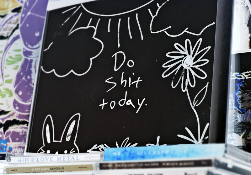 Chalkboard with 'Do Shit Today' message