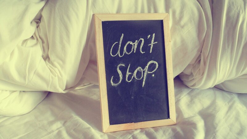 Chalkboard with 'don't stop' message