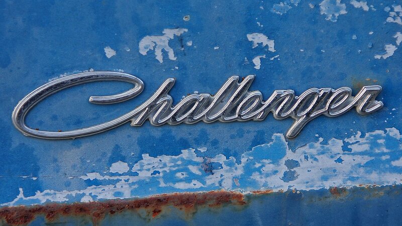 Challenger emblem on weathered blue surface