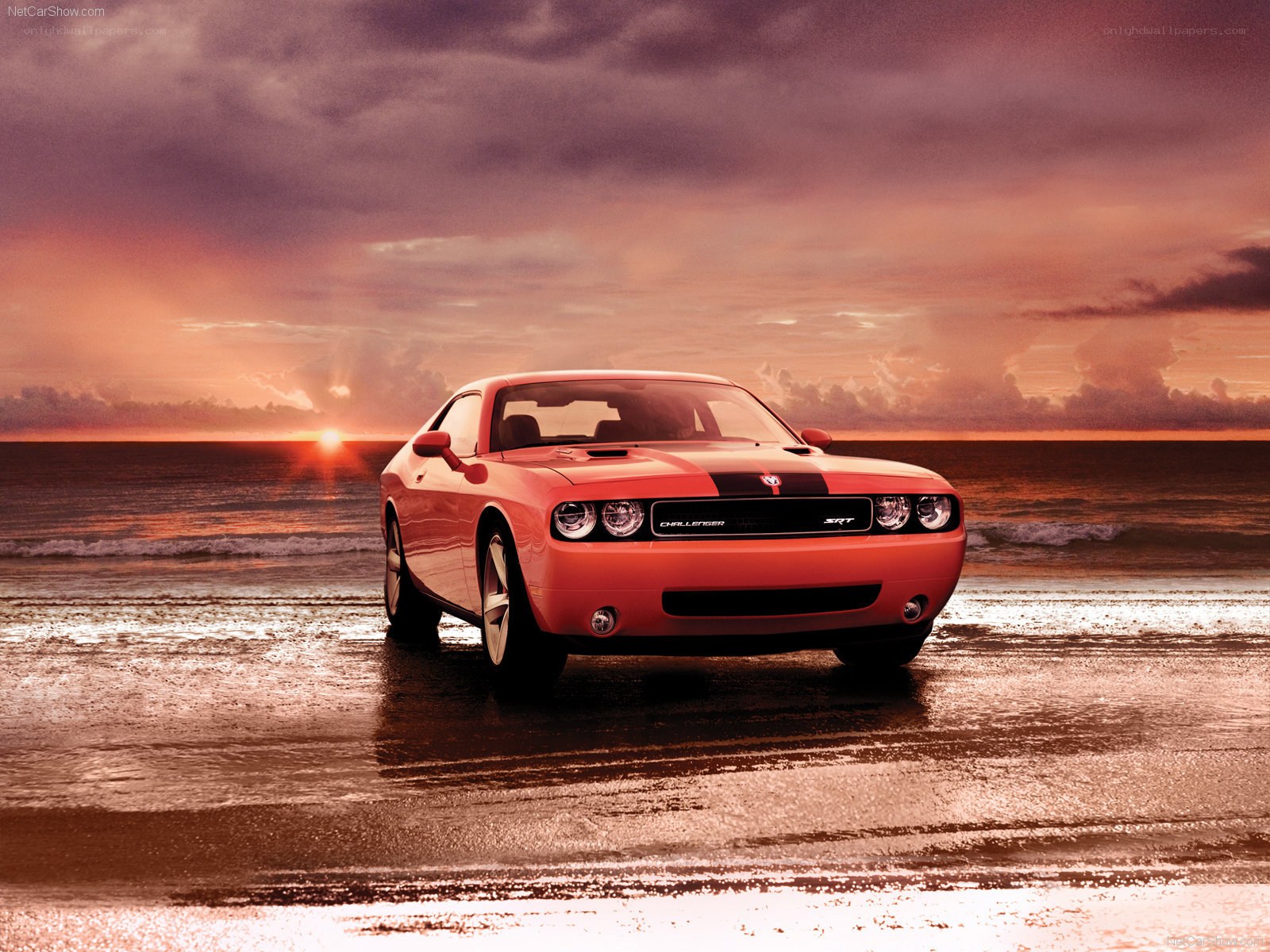 Challenger SRT on beach at sunset