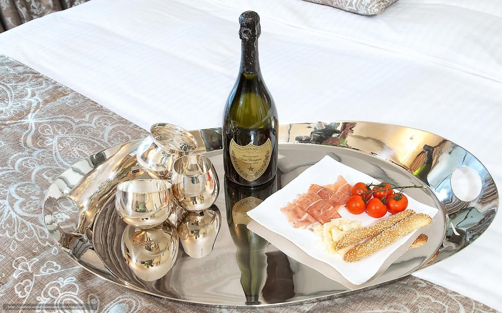 Champagne and appetizers on a tray