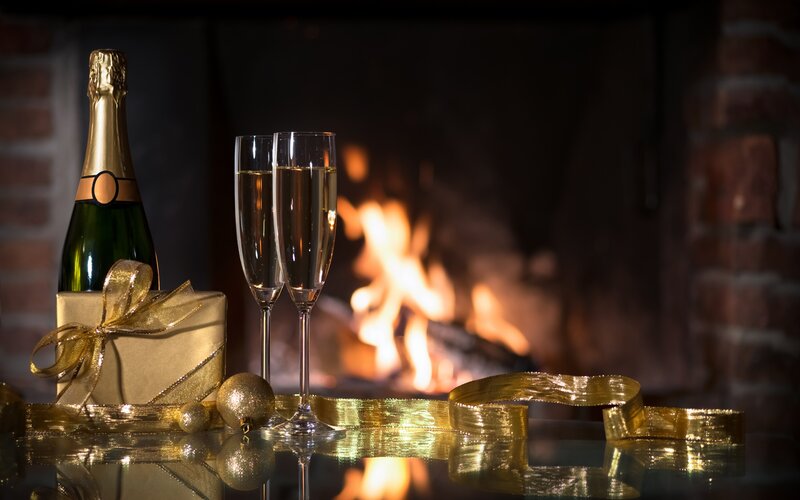 Champagne and Gifts by Fire