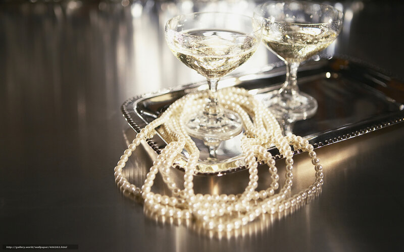 Champagne and pearls on tray