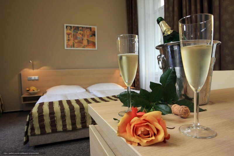 Champagne and rose in hotel room